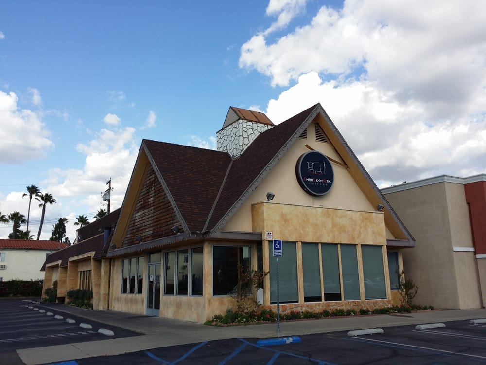 Cham Soot Gol's building on Beach Boulevard under a blue sky